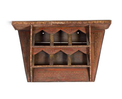 A PAINTED SOFTWOOD HANGING SHELF MOROCCAN, 19TH CENTURY  151cm high, 103cm wide, 18cm deep  SALEROOM NOTICE: Please note the 