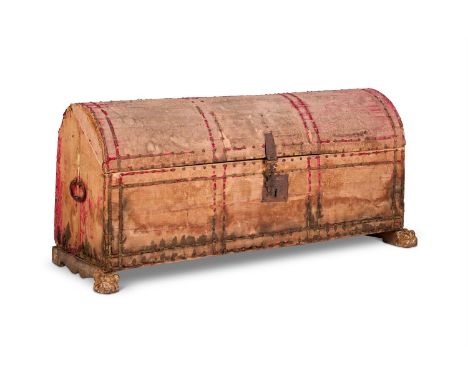 A GILT IRON MOUNTED CRIMSON VELVET COVERED DOMED CHEST  ITALIAN, 17TH CENTURY  The worn velvet secured with decorative brass 