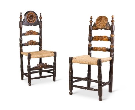 TWO SIMILAR EBONISED AND PARCEL-GILT SIDE CHAIRS  PROBABLY SPANISH, 18TH CENTURY Each with a ladder back and rush seat, both 