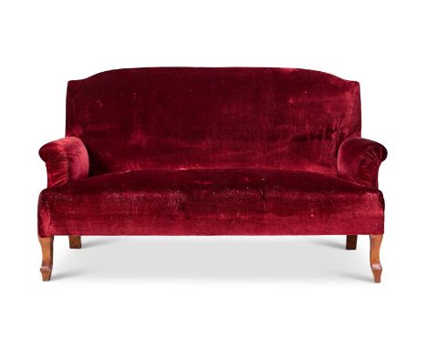 AN OAK AND RED VELVET UPHOLSTERED TWO-SEAT SOFA FIRST HALF 20TH CENTURY  78cm high, 135cm wide, 75cm deep     Condition Repor