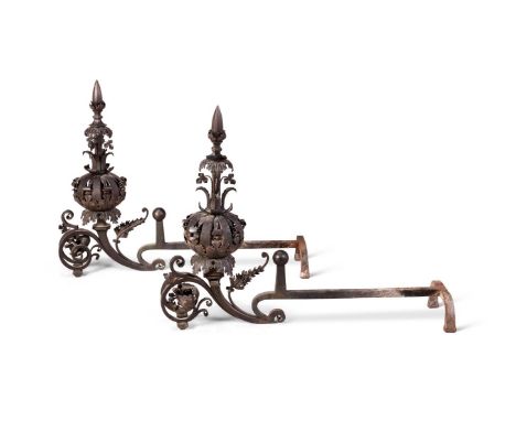 A PAIR OF WROUGHT AND CAST IRON FIRE DOGS  LATE 19TH CENTURY  In the 16th century manner  70cm high       Condition Report:  