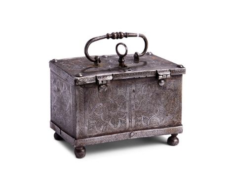 A SMALL ENGRAVED IRON CASKET  POSSIBLY NUREMBERG, 17TH CENTURY  The whole with floral engraving, key and with lock to inside 