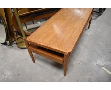 A vintage MCM designer, teak reversible coffee table/bench, probably 1960s, in the style of David Pye/Pye Franklin, approx 10