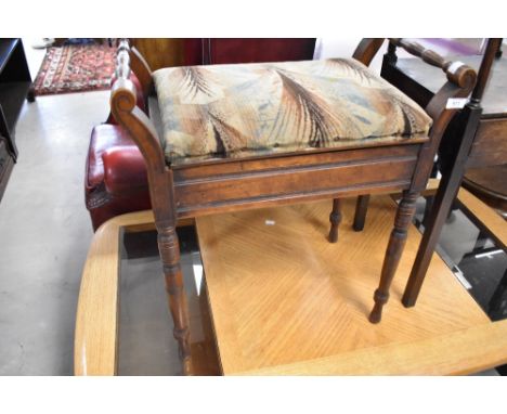 A Victorian mahogany piano stool