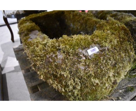 A large limestone trough, approx. 65x45cm
