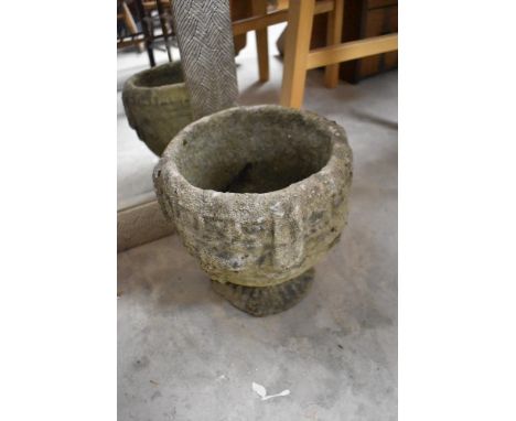 A concrete planter, height approx. 25cm