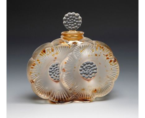 LALIQUE. France ca. 1970.Perfume bottle "Deux fleurs".Moulded and satin-finished glass.Signed on the back of the base Lalique