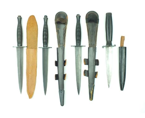A William Rodgers Third Pattern Commando knife, with later sheath, together with two "Crossed Keys" Third Pattern Commando kn