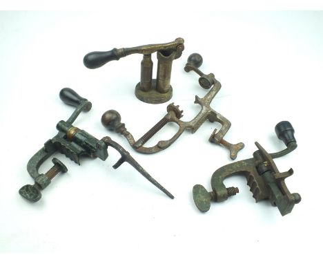 Three bench mounted roll turnover reloading tools, together with a capper decapper. A/F (4)