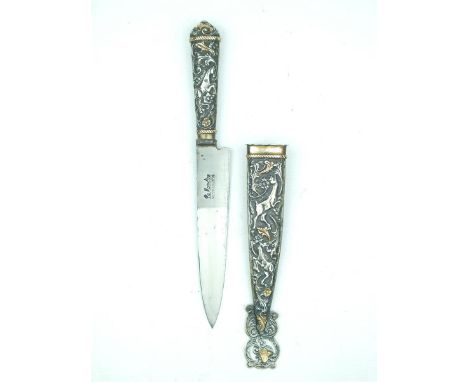 An Argentinian Gaucho knife, 16cm blade with faceted back edge and stamped La Movediza INDUSTRIA ARGENTINA, characteristic wh