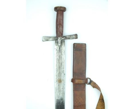 A Sudanese Kaskara, 92cm fullered broadsword blade incised with stylised crescent moons, characteristic leather bound hilt, c
