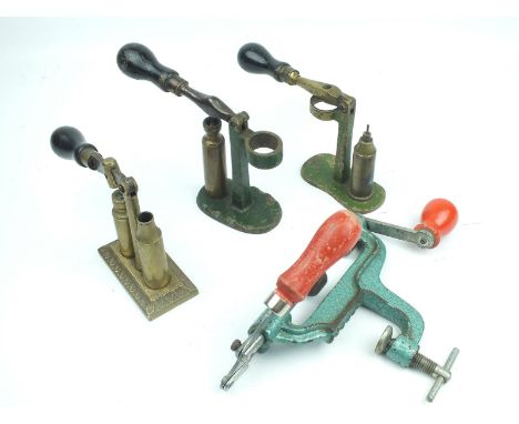 Four various reloading tools, comprising three capper decappers and a bench mounted roll turnover tool. (4)