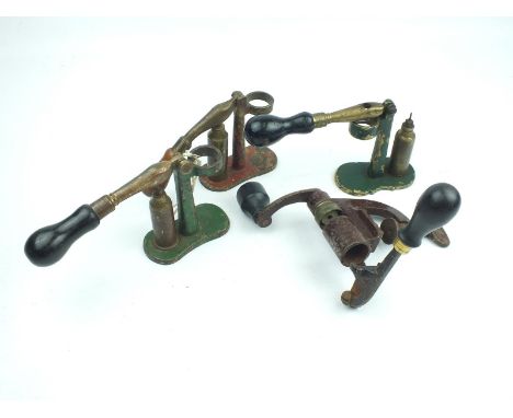 Three 12-bore capper decapper reloading tools, together with a bench mounted roll turnover tool. (4)
