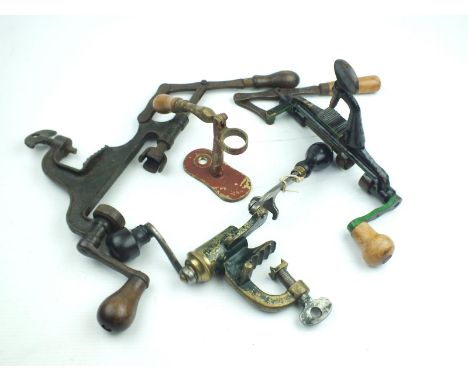 Three bench mounted roll turnover reloading tools, together with the parts of a capper decapper. (4)