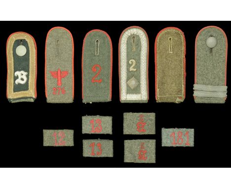 German Second World War Artillery Shoulder Boards and Slip-Ons. 2 pairs of numbered slip-ons. 2 individual single slip-ons. 6
