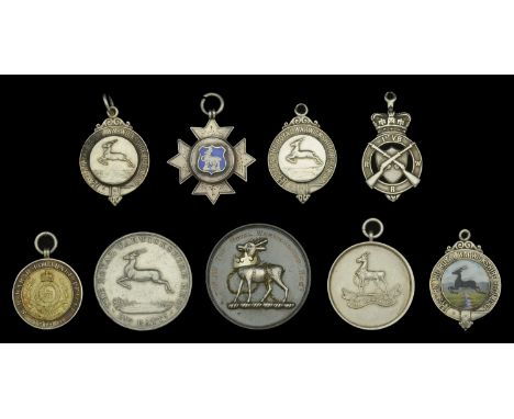 Regimental Prize Medals (9), Royal Warwickshire Regiment (9), mostly silver, one with yellow metal centre mount, some enamell