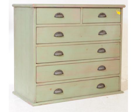 A 19th century Victorian painted pine chest of drawers. The chest of drawers having chamfered edge to top and being raised ov