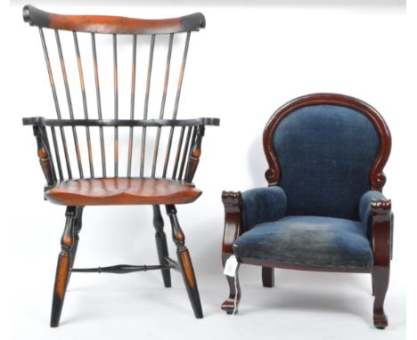 Two 20th century apprentice piece chairs to include an American comb back Windsor chair with ebonised details together with a