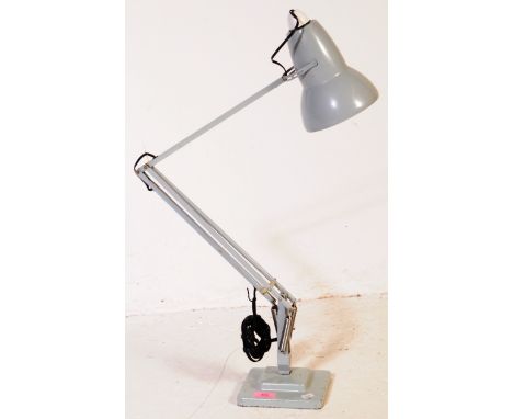 Herbert Terry - A mid 20th century angle poise industrial factory metal desk top table lamp light. Having a conical shade on 