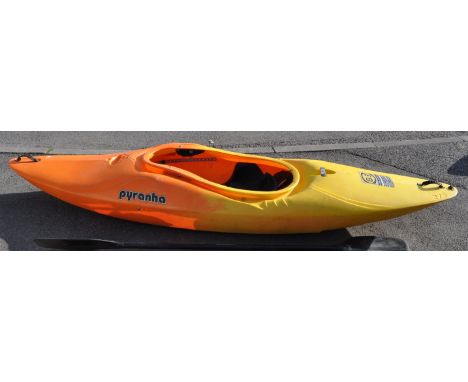 A Pyranha G:3 kayak / canoe 275&nbsp; G series. Together with a kloo double oar / paddle and NKE splash skirt. Measures appro