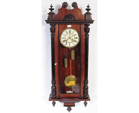 A Victorian 19th century mahogany Vienna regulator 8-day wall clock in the manner of Gustav Becker. Large glass window with d