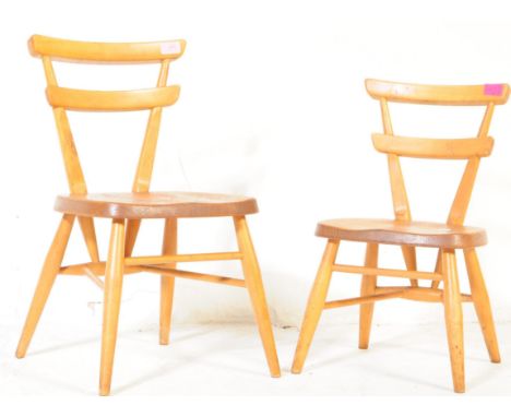 Ercol Furniture - Two mid 20th century retro yellow dot children's chairs. Of beech construction with triangle slat backrests