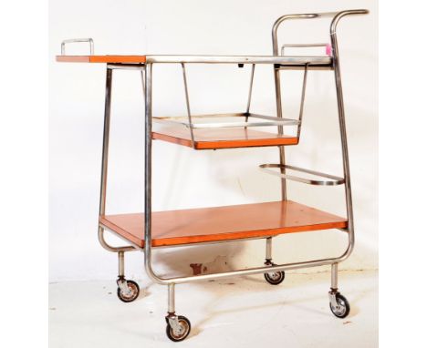 A vintage retro three tier Finnish / Finland aluminium and formica drinks trolley. With three tier gallery with sliding desig