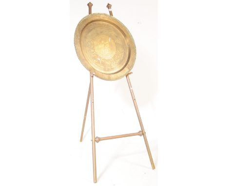 A vintage mid 20th century circa 1970s brass oriental Asian Hong Kong tray / charger plate. Having a Chinese symbol to centre