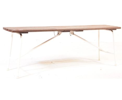 A vintage 20th century folding gym bench. Of rectangular form with five wooden slate top with painted tubular metal frame wit