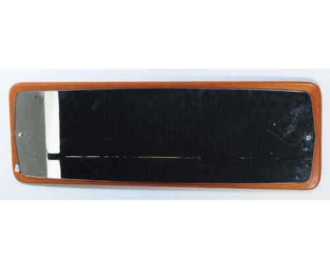 A mid 20th century Danish inspired hanging wall mirror. Having a rectangular mirrored panel mounted on teak veneered base. Me