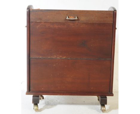A vintage Besway teak effect cocktail drinks trolley retailed by Harrods, with lift-top and drop-down side. All raised on tre