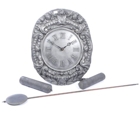 A 20th century pewter wall hanging clock. The clock having roman numeral to chapter ring with moulded decoration to face surr