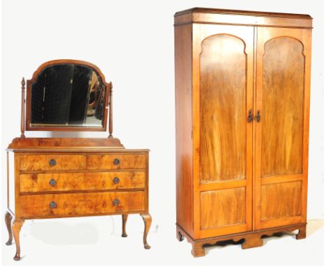 A 1930s Queen Anne revival walnut and mahogany dressing table and double wardrobe. The dressing table having central mirror o
