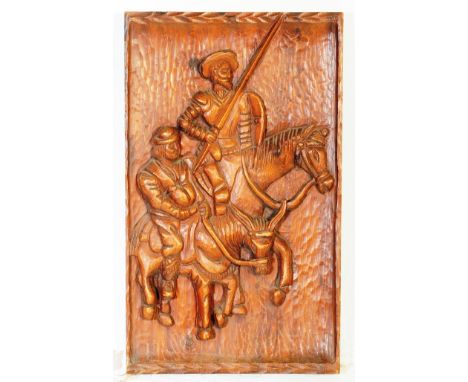 A vintage 20th century hand made carved oak wall mountable wooden panel of Don Quixote and Sancho Panza. Both on horseback, D