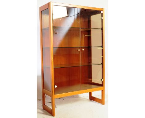 British Modern Design - A 1960s / 1970s&nbsp;vintage teak wood glass display cabinet by&nbsp;Turnidge Furniture, London.Havin