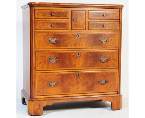 A 20th century Queen Anne revival faux chest of drawers / tv cabinet. Raised on bracket feet with faux scotch cupboard drawer