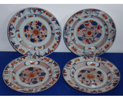 A set of four late-18th century Chinese export porcelain plates hand-gilded and decorated typically in the Imari palette, 22.