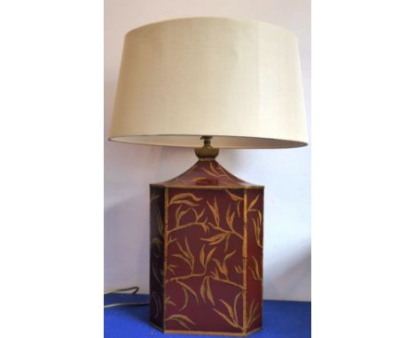 A Porta Romana octagonal Toleware table lamp; gilded bamboo decoration against a red ground in Chinese style; oval shade; ful