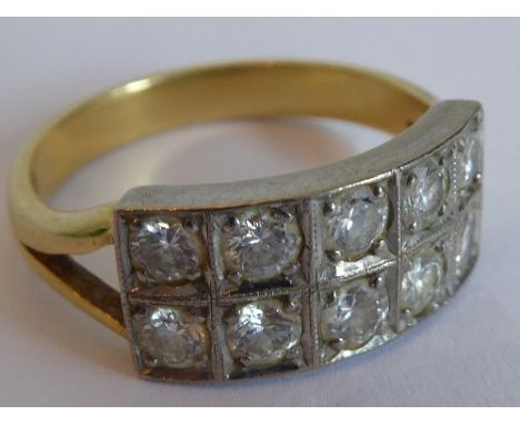 An 18 carat yellow gold dress ring horizontally set with two bands of five fine quality diamonds, ring size 'O/P' CONDITION R