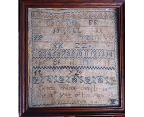 A small oak-framed and glazed early 19th century George III period sampler: Grace Wilson in the 10th year of her age AD 1814;