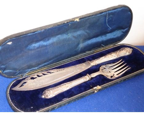 A 19th century cased hallmarked silver fish slice and fork set; the pierced slice decorated with scrolling foliage and the fi