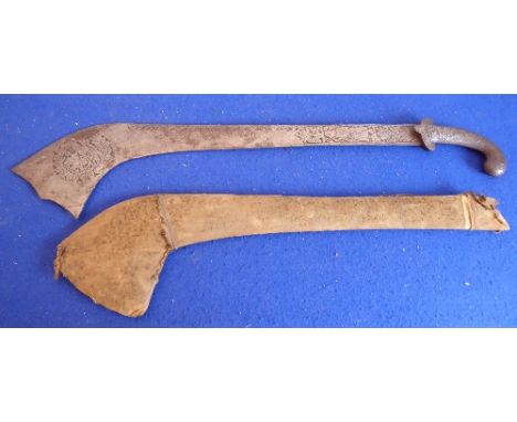 An early 19th century Kora fighting sword and scabbard (probably Nepalese); interesting brass-inlaid blade decorated with a f