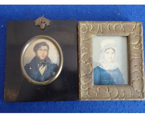 Two 19th century portrait miniatures: one oval and of a gentleman with curls, polka dot neckerchief and blue jacket and the o