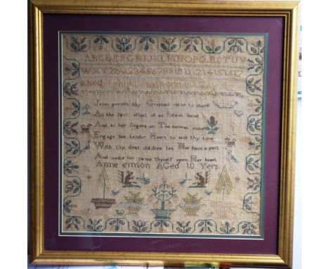 A gilt-framed and glazed early/mid 19th century sampler with animals, alphabet, numerals,   patterns etc.: Anne Emson aged 10