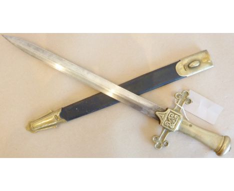 A Scots Guards bandsman's ceremonial dagger-sword with unmarked 13" blade, leather and brass scabbard engraved 'S.G. 44'; the