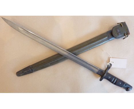 A World War I Remington Pattern 17 bayonet and scabbard, 17” blade stamped with Franford Arsenal blazing grenade mark and eag