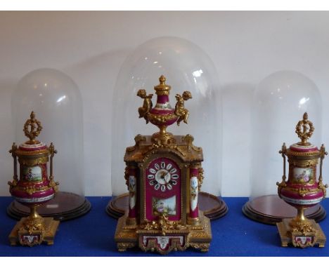 A 19th century French gilt-metal three-piece clock garniture with hand-decorated Sèvres-style porcelain panels, columns and u