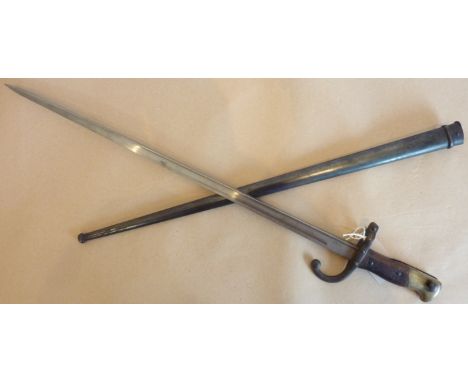 A French Model 1874 Gras Bayonet with matching scabbard (serial no. 88040), clean blade marked 'St.  Etienne, Août 1877'