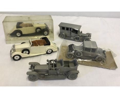 3 Danbury Mint pewter Rolls Royce model cars, 1911 & 1907 Silver Ghost and a 1928 Doctor's Coupe. Together with 2 other Rolls