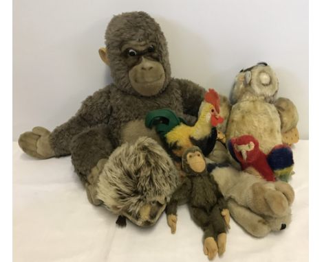 A box of 7 vintage Steiff soft toys. None with their buttons. To include 'Lora' parrot and Rooster. N.B. Dog and Owl missing 